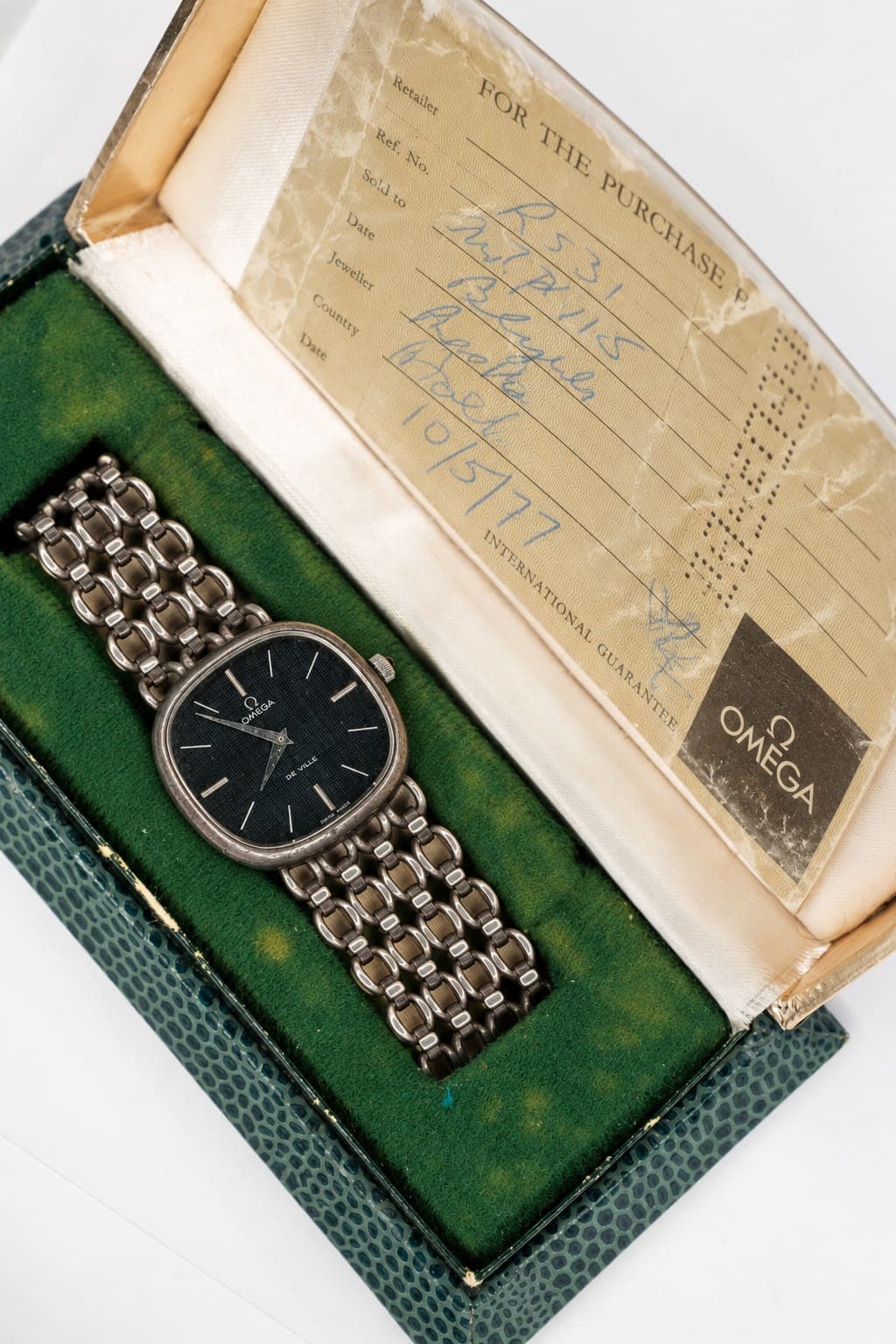 A vintage Omega presented in a green velvet box